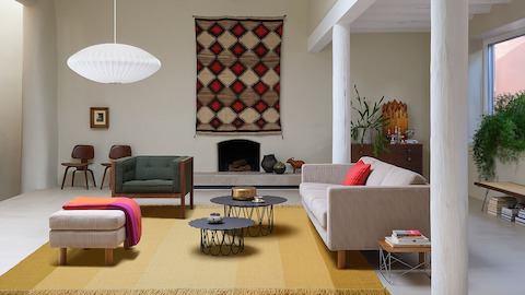 A modern living room that features Girard Flower Table, an archival classic making its return to our collection.