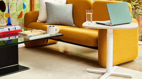 A white Passport Work Table in a living room.