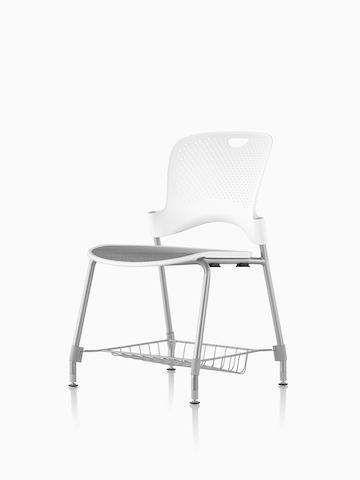 White Caper Chair with suspension seat, metal legs, and storage basket underneath the seat.