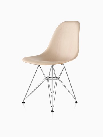 Eames Molded Wood side chair with a light finish and wire base, viewed from a 45-degree angle.