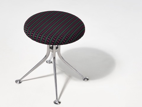 A single Girard Stool with an aluminum base and upholstered in Mexidot.