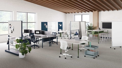 OE1 Workspace Collection products in an open floor setting, including tables, movable walls, wall rail and boards, with Keyn chairs.