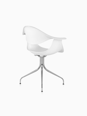 Three-quarter rear view of a white Nelson Swag Leg Armchair.