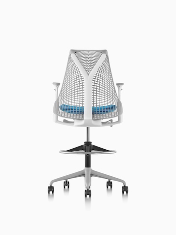 Light gray Sayl Stool with a blue seat, viewed from the rear.