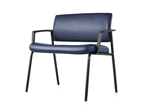 An angled view of a Verus Plus Chair with arms upholstered in blue vinyl.