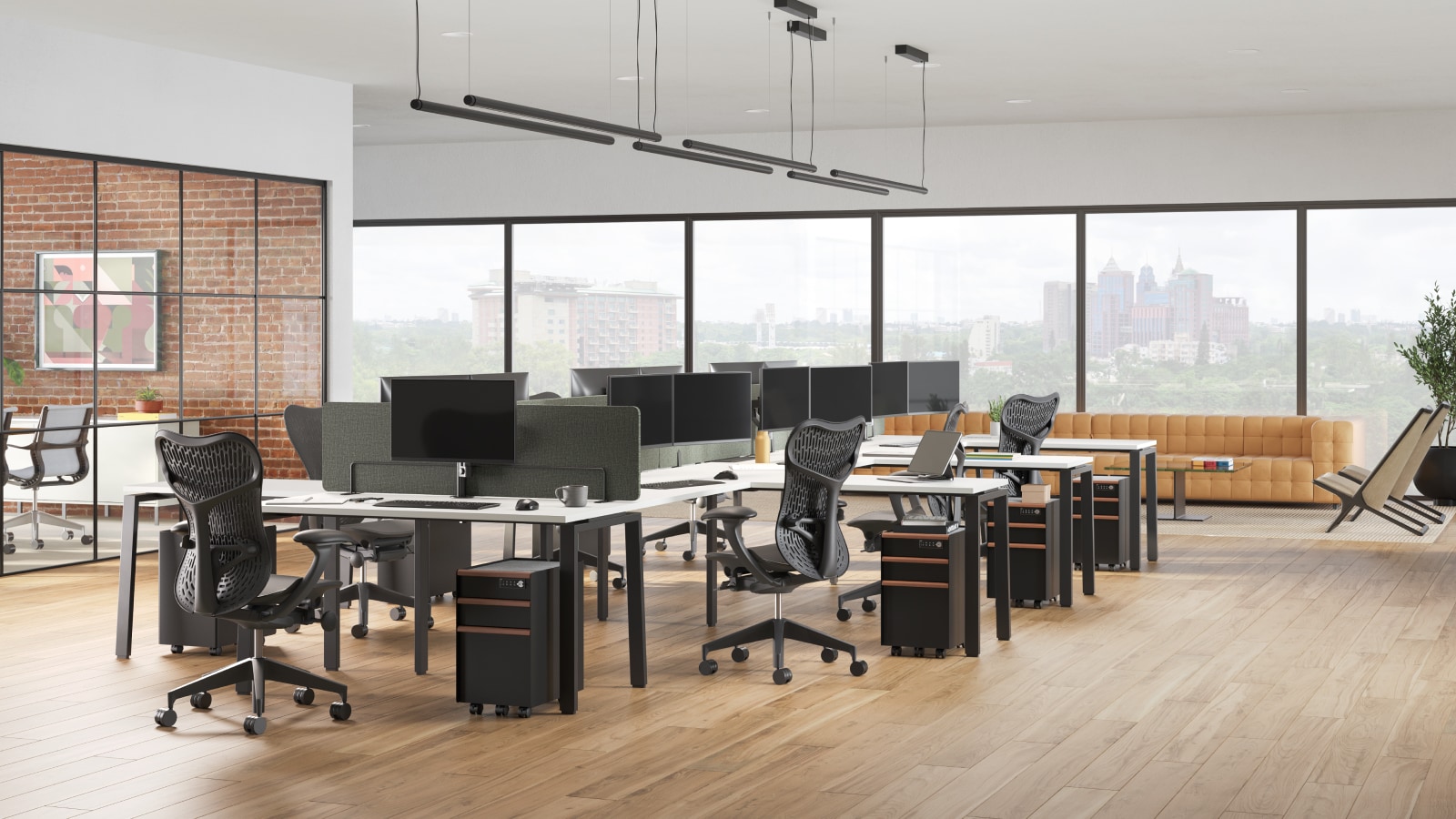 Trac pedestals on castors, Byne Desks and Mirra 2 Chairs, with a meeting room to the left and lounge seating in the back.