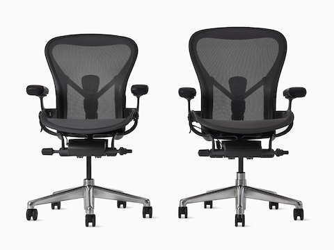 Two Aeron ESD Chairs in sizes B and C with graphite finishes sit beside each other.