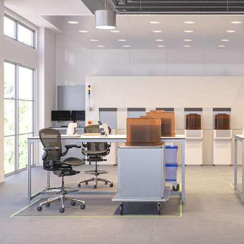 Aeron ESD Stools at stations in a cleanroom setting.