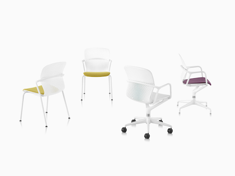 Four Keyn chairs in white, yellow and purple with five-star, four-star and four-leg bases, viewed from the side, front and back angle.