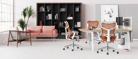 Byne System with Optimis legs in a conference table setting with a screen, Mirra 2 chairs and a UBI Mobile Bag Catch.