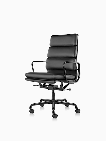 Black Eames Soft Pad Chair. Select to go to the Eames Soft Pad Chairs product page. 