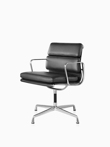 Black Eames Soft Pad Chair. Select to go to the Eames Soft Pad Chairs product page.