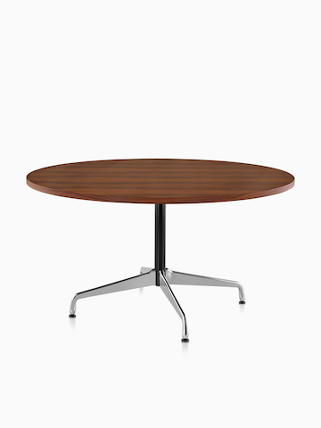 A round Eames Table with a dark veneer top. Select to go to the Eames Tables product page.