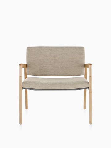 A Monarch Plus chair with a wide seat and beige upholstery.