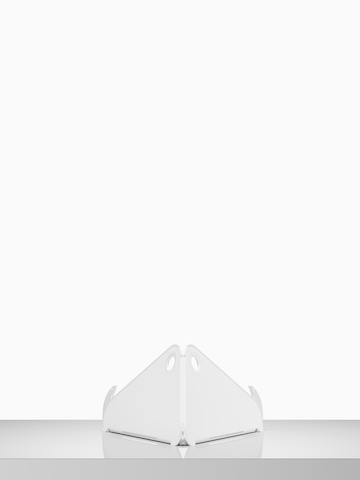 A back view of an open Oripura Laptop Stand on top of a worksurface.