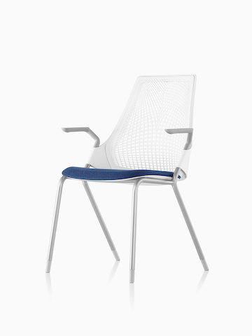 White Sayl Side Chair with a blue seat. Select to go to the Sayl Side Chairs product page.