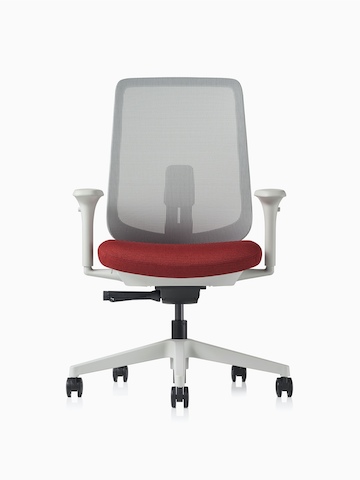A Verus Chair with a red seat and grey suspension back.